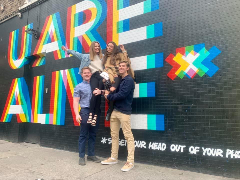 CAPAStudyAbroad_Summer2019_Dublin_Katie Berlin_Sara, Daniel, Michael, and I in front of Dublin mural